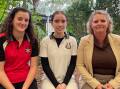 Year 12 students Sienna ONeill and Skye Carter, with Batemans Bay High School principal, Paula Brennan. Picture by Vic Silk.