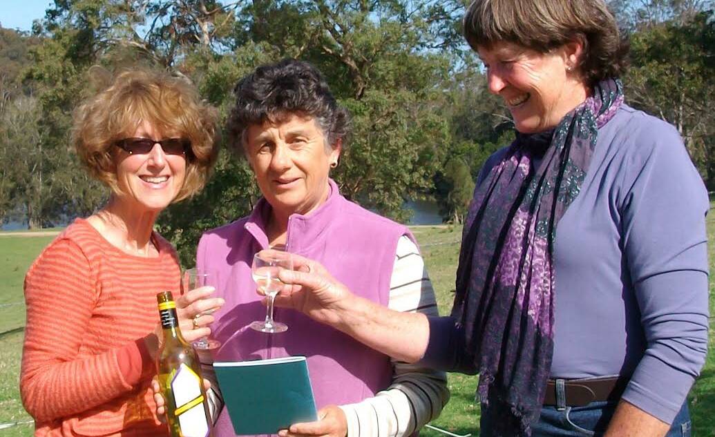 From left to right: Sue Knight, Paddy Naughton and Betty Jeffery celebrate the publication of the first Bodalla Poets' Breakfast booklet of poetry in 2012.
Picture by Jo Rugg.