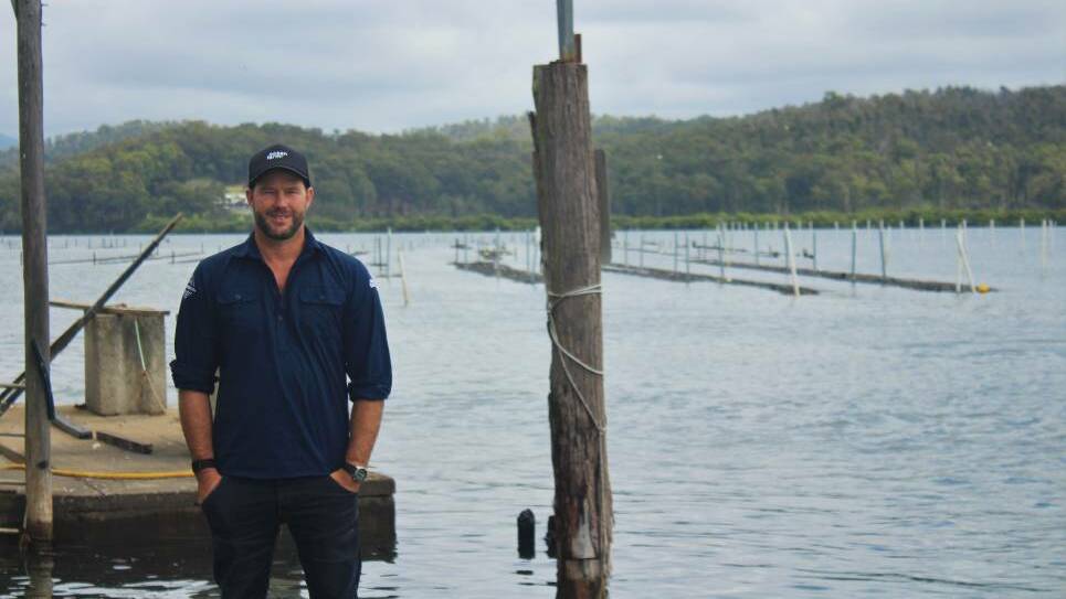 Ewan McAsh at his oyster farm on the Clyde river. Picture by James Tugwell.