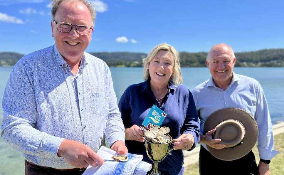 Bega member Dr Michael Holland, Cath Peachey, chair of Narooma Rocks and David Harris, MP, then shadow minister for jobs, investment and tourism at Wagonga Inlet on Friday, March 10, 2023, announcing a $600,000 commitment over three years to grow the Narooma Oyster Festival. Picture by Narooma Rocks.