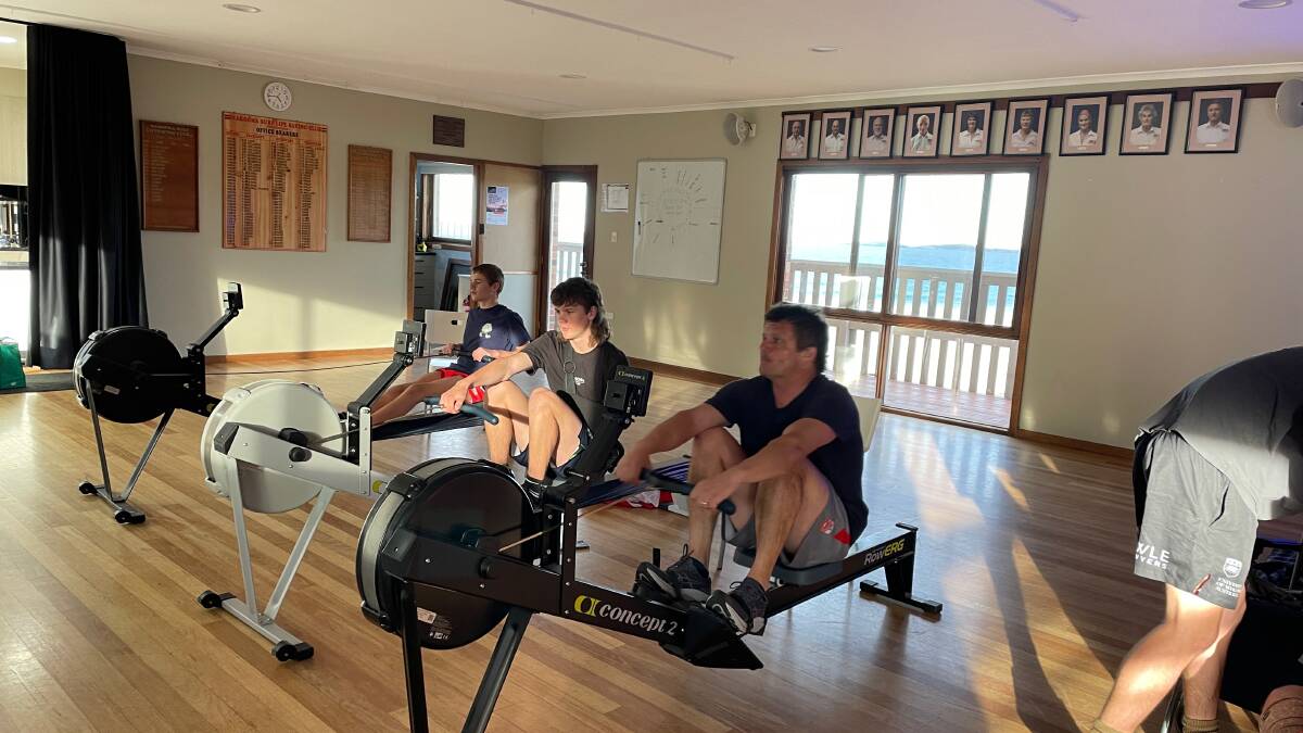 Ty Constable, Johnny Constable and Brendan Constable did multiple sessions on the rowing machines for Narooma Surf Lifesaving Club's first time in the Gotcha4Life 24 Hour Row. Picture by Marion Williams