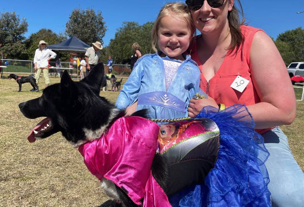It was Charlotte's idea to dress up as Anna and Elsa from Frozen and it won her and Luffy the prize for the best fancy dress costume at Tailwagggers in Narooma on September 17. Picture by Marion Williams