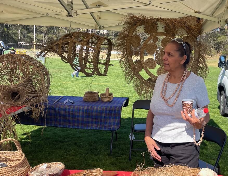 Monaro Yuin woman Aileen Blackburn-Mongta is the granddaughter of Mavis Longbottom, a traditional shell worker from the South Coast and La Perouse. She had travelled from Victoria to attend the Biraga Bunaan Back to Country event with a stall of traditional shell work and basket weaving. Picture by Marion Williams