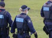 Australian Federal Police officers. Picture Keegan Carroll