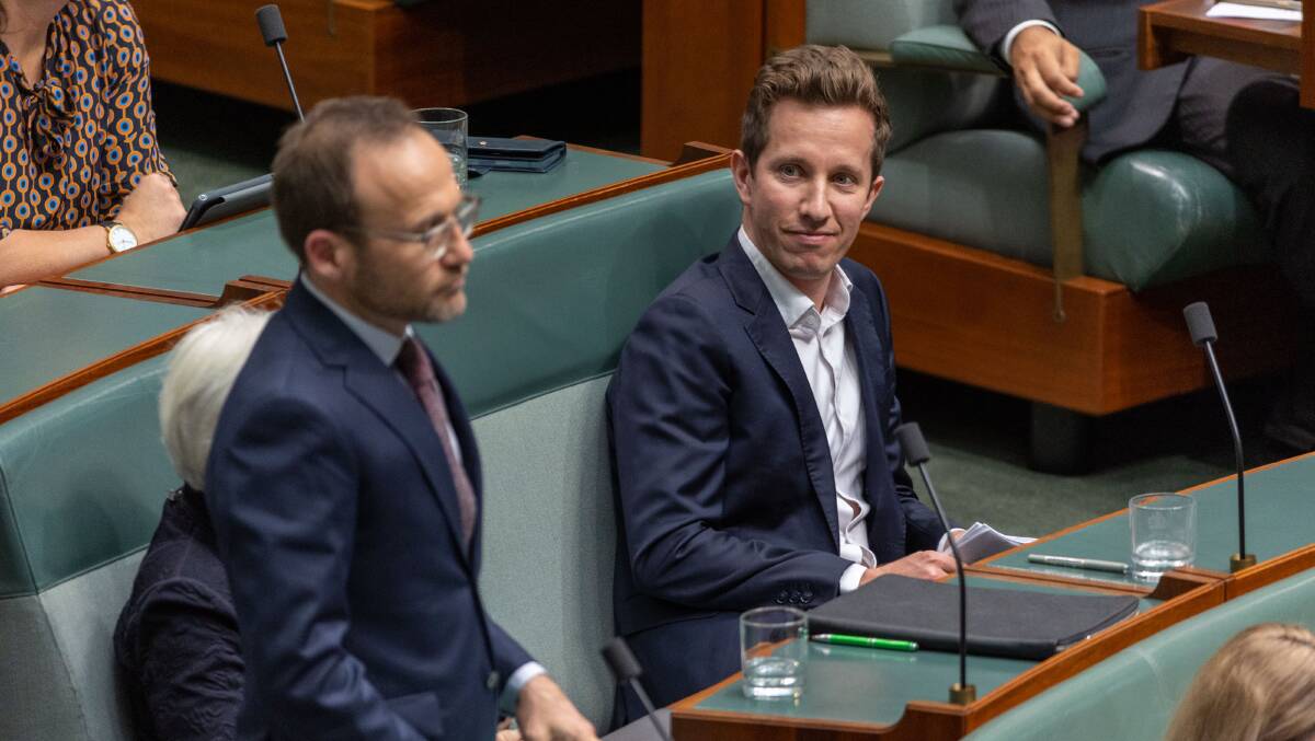 Greens leader Adam Bandt (standing) and Greens housing spokesperson Max Chandler-Mather during Question Time. Picture by Gary Ramage