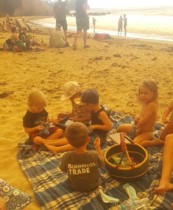 Thousands of families and children evacuated to the beach during the Black Summer bushfires. Picture supplied