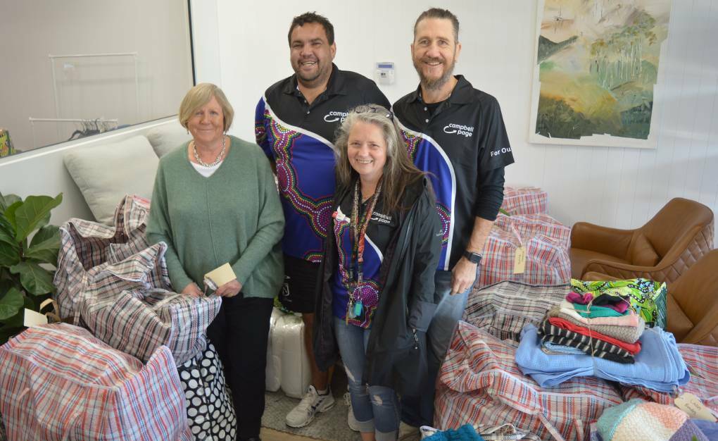 In July 2023, Pat Jameson of Blackshaw Coastal handed over hundreds of bags of donations to Campbell Page. This Christmas, they are again rallying the community to help the disadvantaged and donate. Picture by Megan McClelland