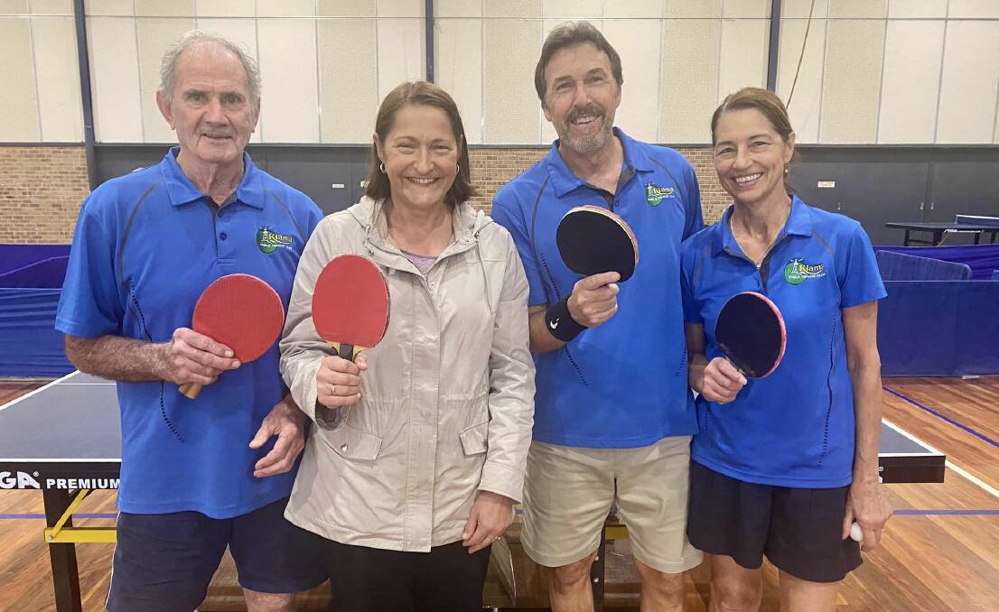 Federal Member for Gilmore, Fiona Phillips, picks up a paddle with members of the Kiama Table Tennis Club. Picture supplied.