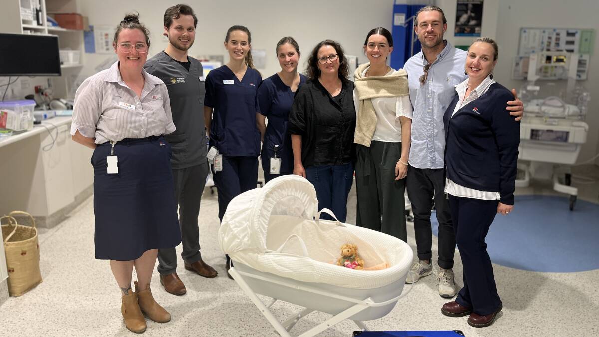 Ashleigh and Andrew (second and third from the right) in the South East Regional Hospital (Bega) maternity ward. Picture by James Parker