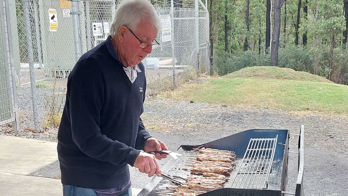 New life member Robert Bugsy Blake cooking the BBQ. Picture supplied.
