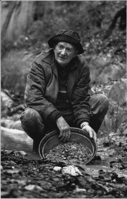 Gold panning in an intermittent creek bed. File picture.