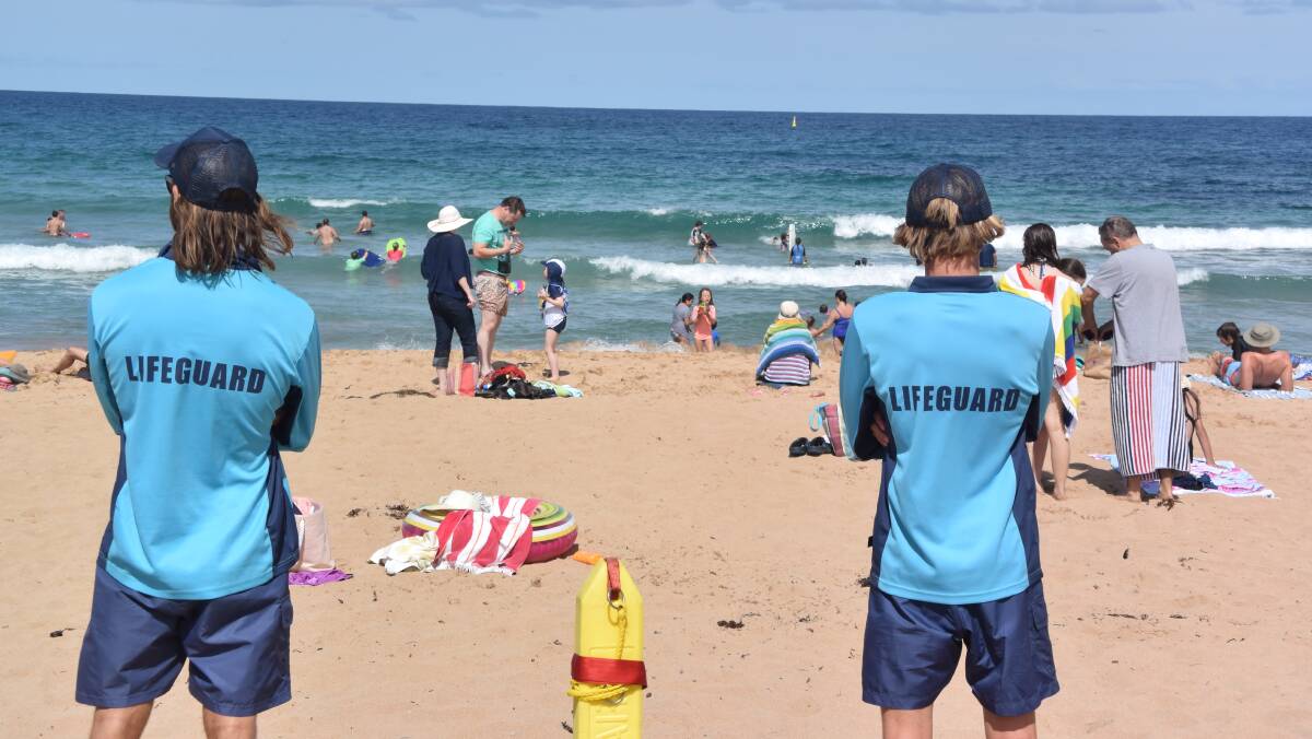 EXTRA ASSISTANCE: Malua Bay lifeguards Rory Brini and Reegan Mealy have help patrolling the beach. A shark listening station has been deployed behind the break.