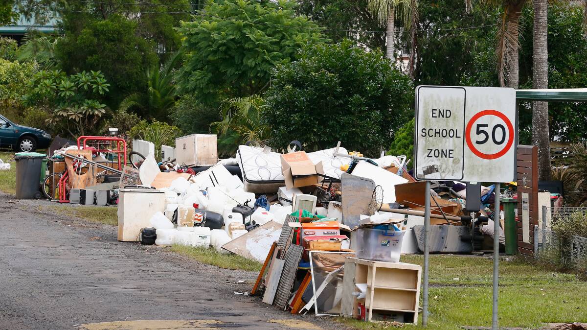 Lismore streets were lined with trash as residents begin the clean-up after the flood.