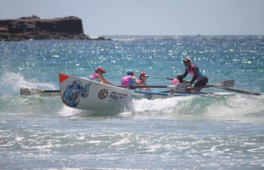 SURF'S UP: Batemans Bay's Open Women's crew competes in the third round of the Warilla Surfboat Series.