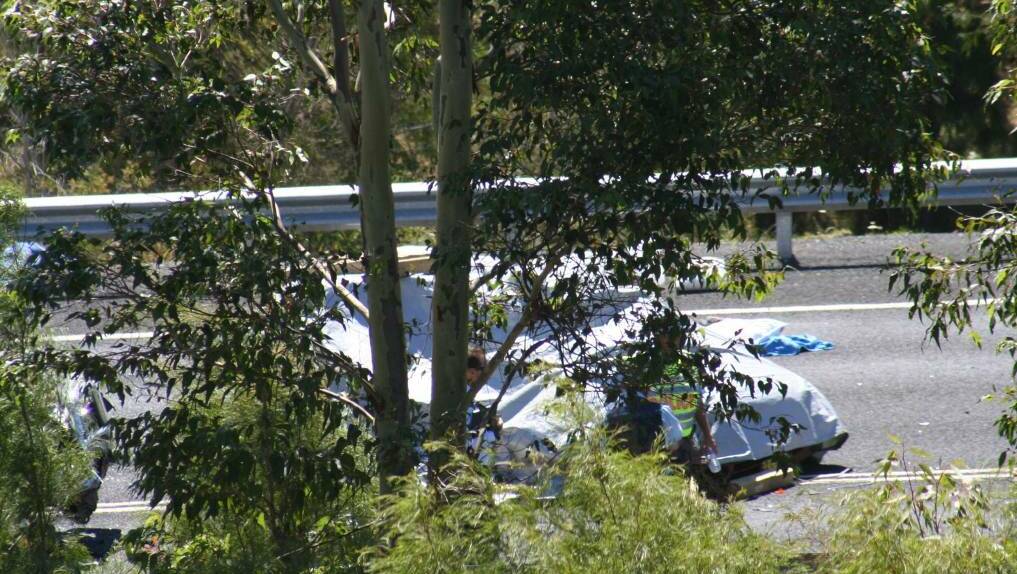 Police at the scene of the crash on the Princes Highway. Photo: supplied
