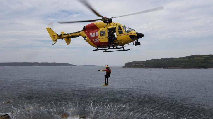 The surf rescue helicopter is often busiest on days when the ocean is deceptively calm. Photo: Nick Moir
