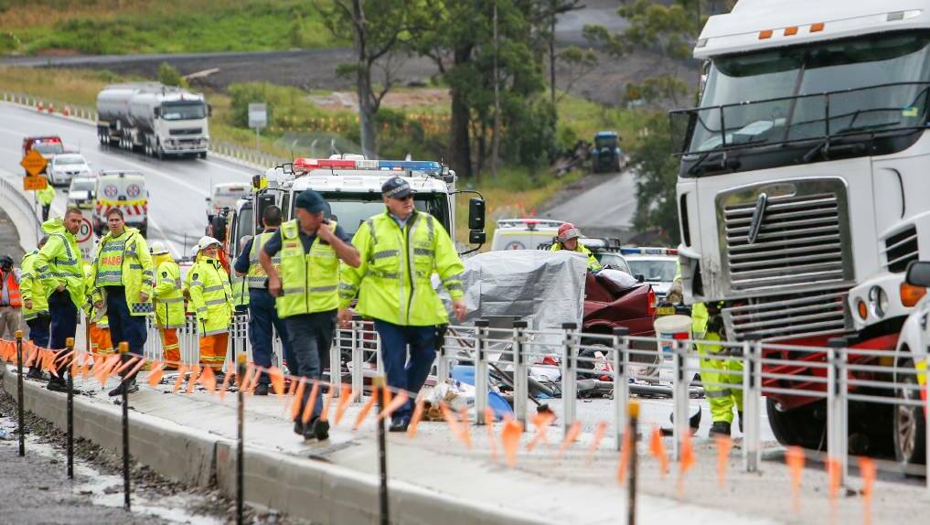 Emergency services at the crash site on the Princes Highway in Berry. Photo: Adam McLean
