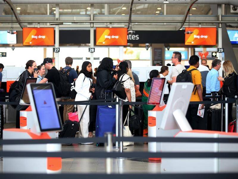 Travellers are urged to be patient as airports and prepare for their busiest day in four years. (Nikki Short/AAP PHOTOS)