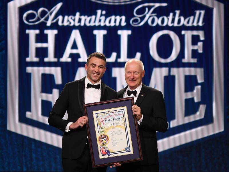 Corey Enright (left) was honoured at the 2023 Hall of Fame ceremony by AFL chairman Richard Goyder. (Julian Smith/AAP PHOTOS)