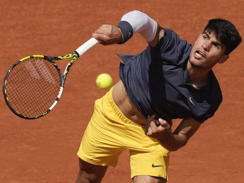 Carlos Alcaraz on his way to an impressive opening victory over American JJ Wolf at the French Open. (AP PHOTO)