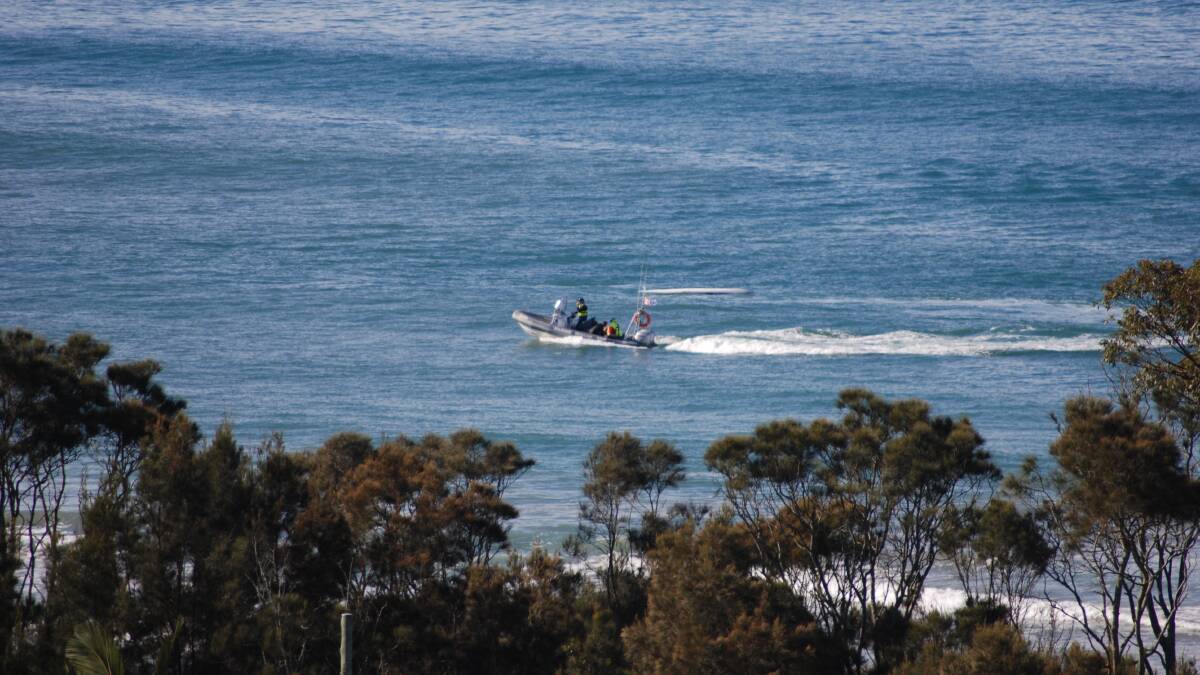 A Marine Rescue boat at last July's incident at Surf Beach. Picture: John Hanscombe. 