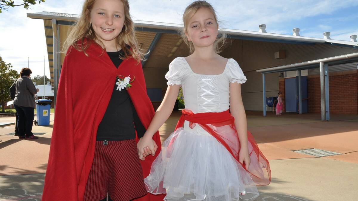 Abby Woolridge as Little Red Riding Hood and Chloe Backhouse as a Ballerina.